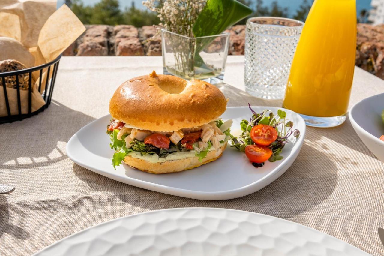 Soho Boutique Castillo De Santa Catalina - Adults Recommended Malaga Exterior photo A chicken caesar salad bagel
